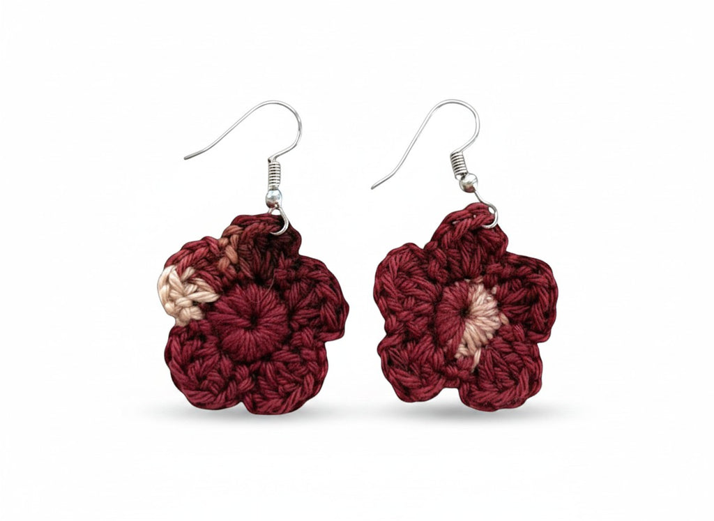 Criminal Crochet burgundy and beige crocheted flower earrings with intricate floral design. Lightweight yarn.