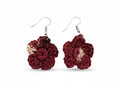 Criminal Crochet burgundy and beige crocheted flower earrings with intricate floral design. Lightweight yarn.