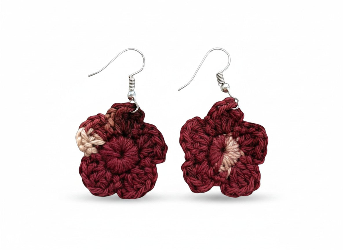 Criminal Crochet burgundy and beige crocheted flower earrings with intricate floral design. Lightweight yarn.