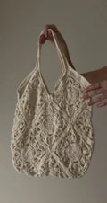 Criminal Crochet cream cotton crocheted tote bag with intricate mandala and geometric patterns, open-weave design, and sturdy straps.