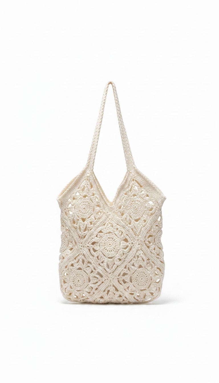 Criminal Crochet cream cotton crocheted tote bag with intricate mandala patterns and sturdy straps.